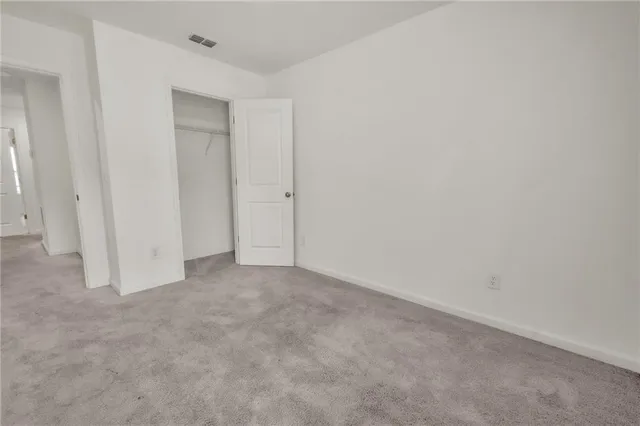 a bathroom with a sink vanity and a mirror