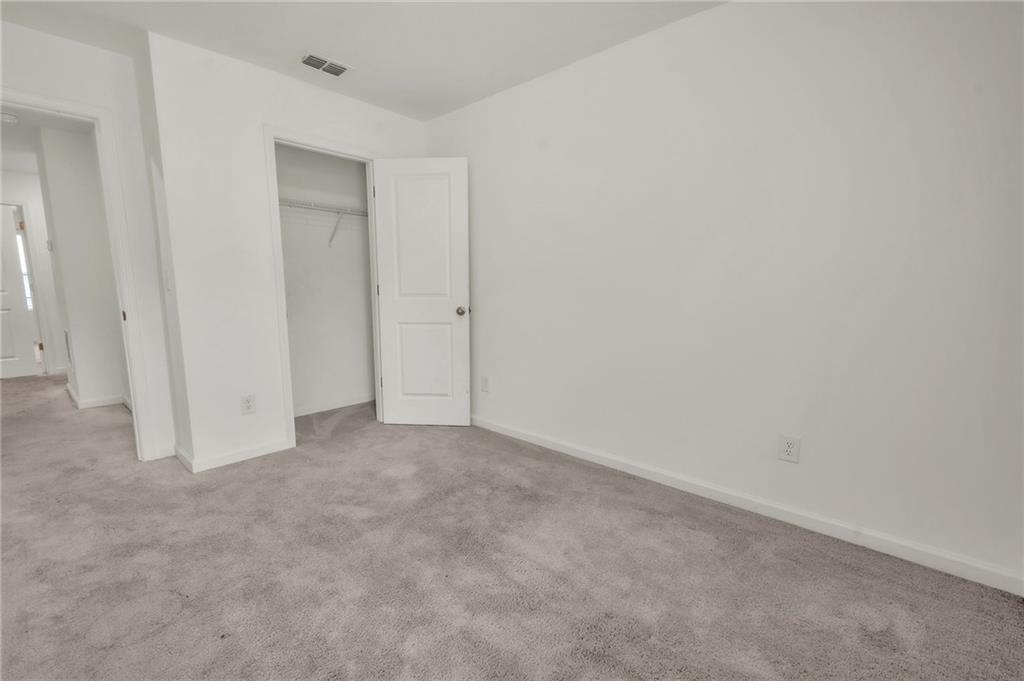 1517 Vernon Boulevard Decatur, GA 30035 - Photo 18 of 25 a view of an empty room and entryway