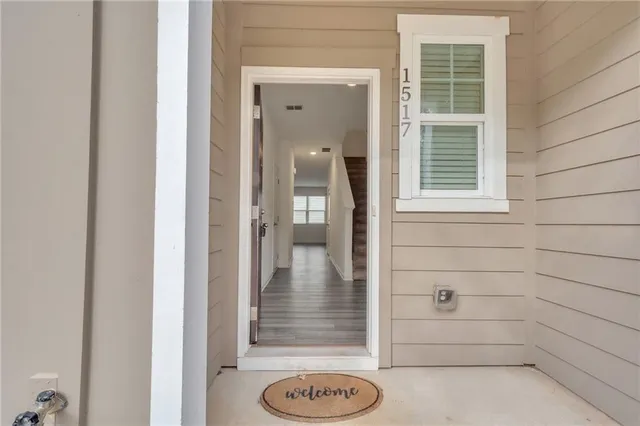 a view of staircase with wooden floor and stairs