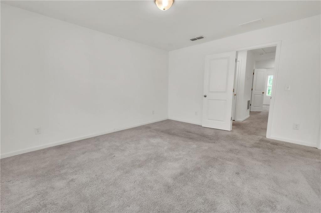 1517 Vernon Boulevard Decatur, GA 30035 - Photo 9 of 25 a view of empty room