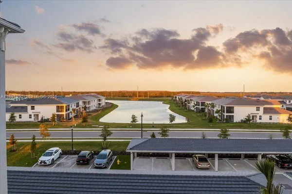 a backyard of a house with lots of green space and mountain view