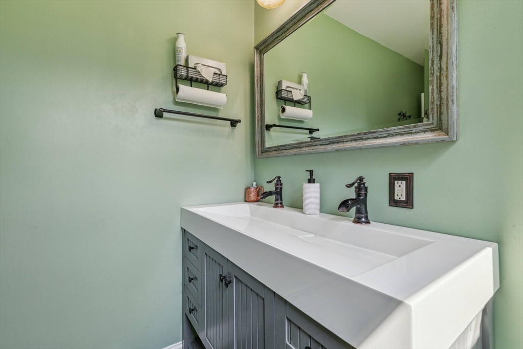 19 Cross Road Boxford, MA 01921 - Photo 12 of 41 a bathroom with a sink and a mirror