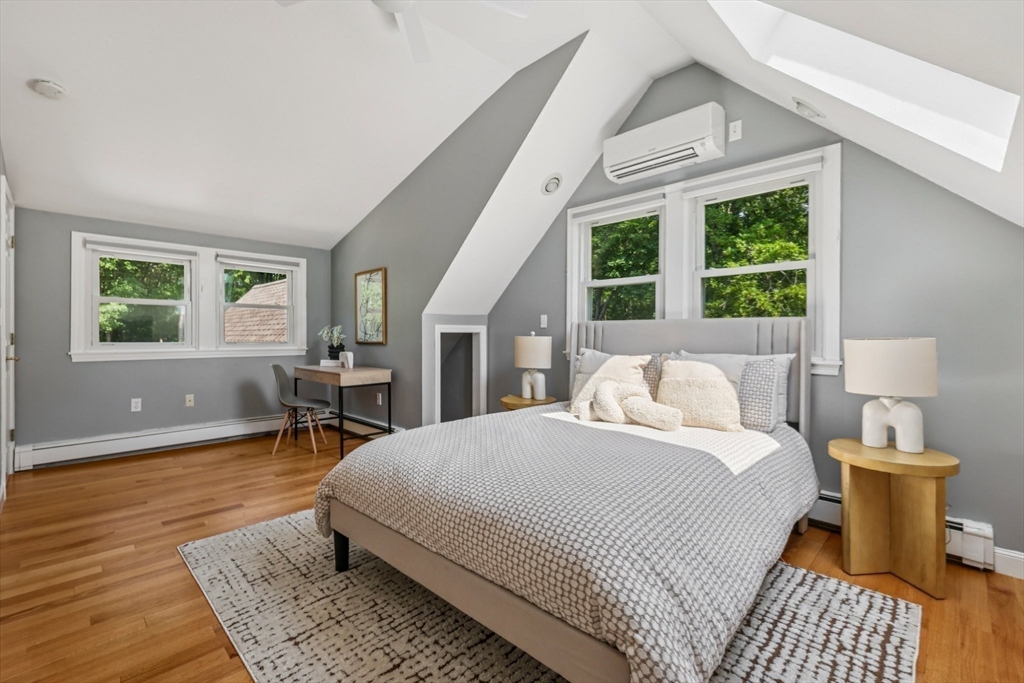 19 Cross Road Boxford, MA 01921 - Photo 15 of 41 a bedroom with a bed a table and a window