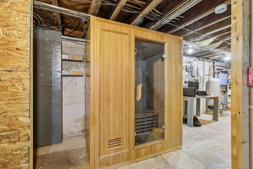 19 Cross Road Boxford, MA 01921 - Photo 30 of 41 a view of a hallway with wooden walls