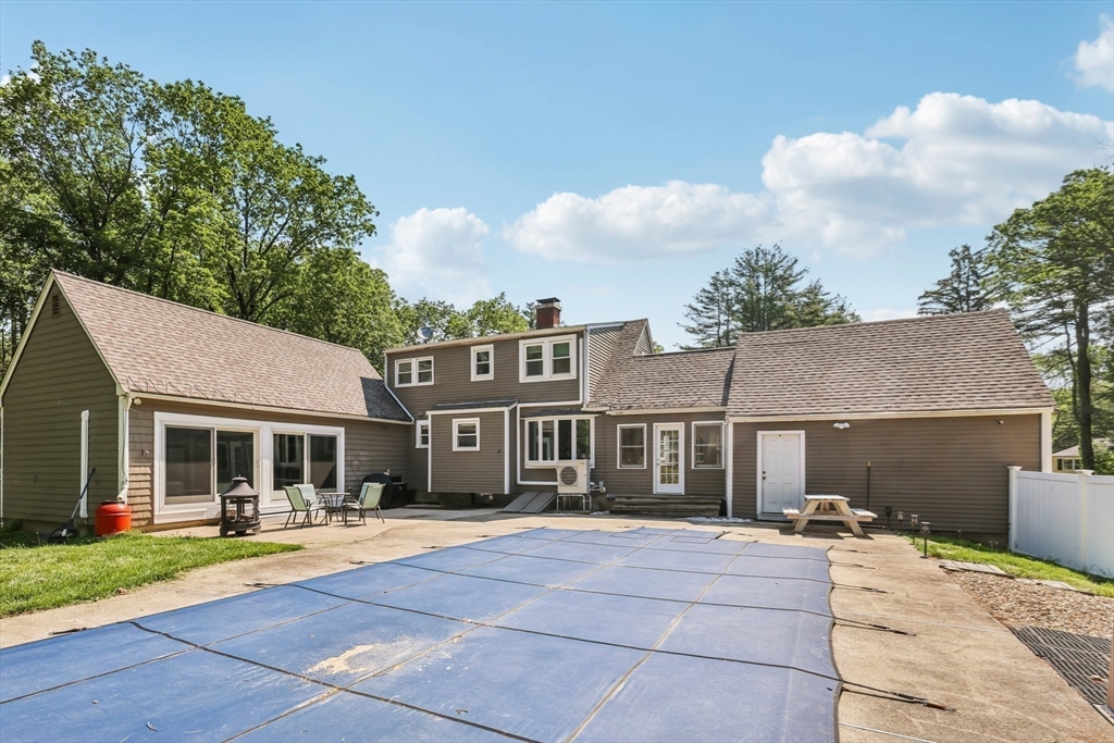 19 Cross Road Boxford, MA 01921 - Photo 32 of 41 a front view of a house with a yard