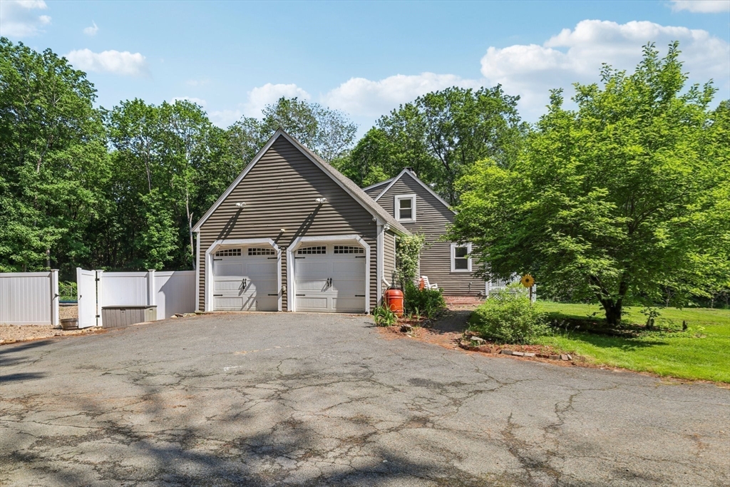 19 Cross Road Boxford, MA 01921 - Photo 38 of 41 a view of a house with a yard