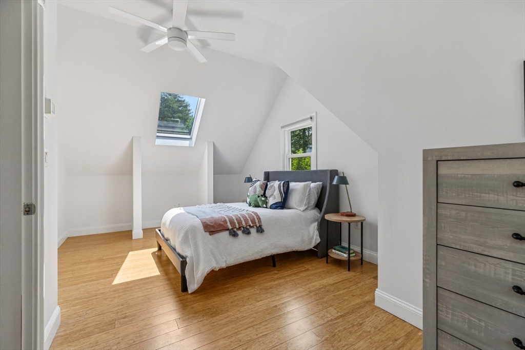 19 Cross Road Boxford, MA 01921 - Photo 7 of 41 a spacious bedroom with a bed and a window