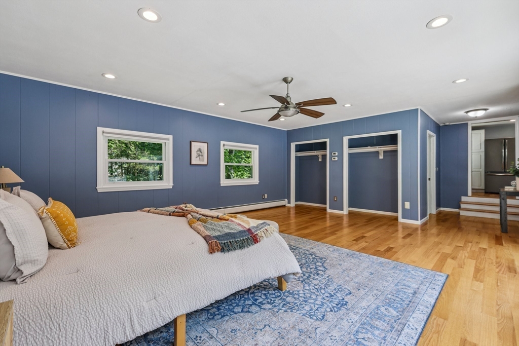 19 Cross Road Boxford, MA 01921 - Photo 8 of 41 a bed room with a bed and a couch