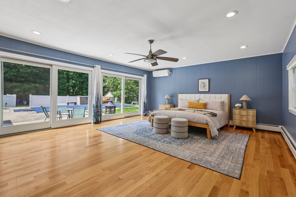 19 Cross Road Boxford, MA 01921 - Photo 9 of 41 a living room with furniture and a fireplace