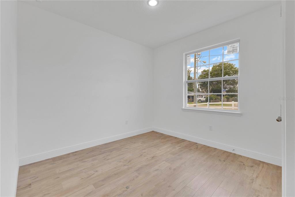 1425 River Road St. Cloud, FL 34769 - Photo 15 of 32 an empty room with a window