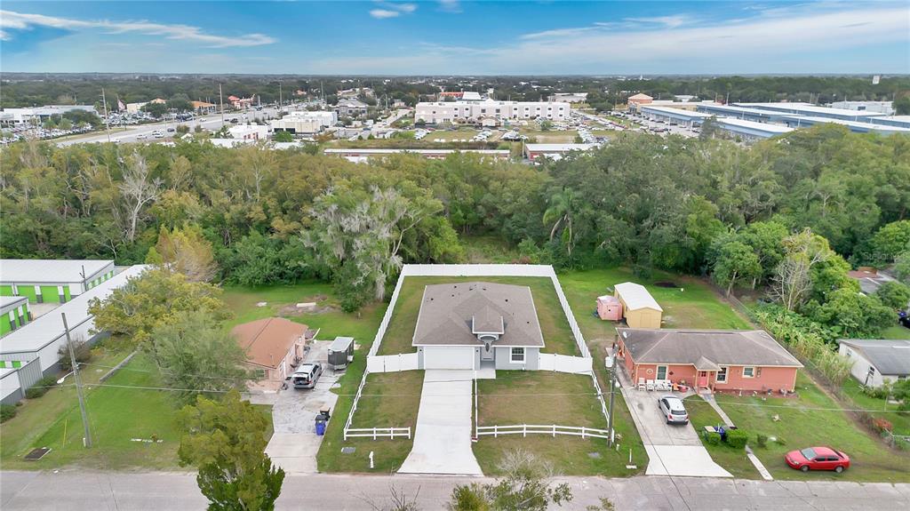 1425 River Road St. Cloud, FL 34769 - Photo 27 of 32 an aerial view of multiple houses with yard