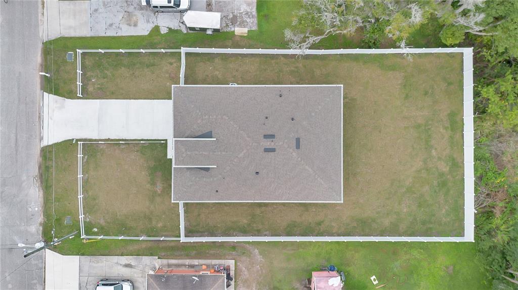 1425 River Road St. Cloud, FL 34769 - Photo 29 of 32 an aerial view of a house with a yard