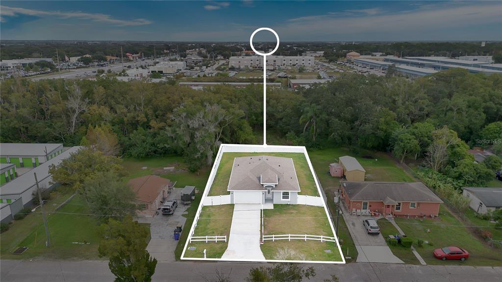 1425 River Road St. Cloud, FL 34769 - Photo 32 of 32 a view of a swimming pool with a balcony
