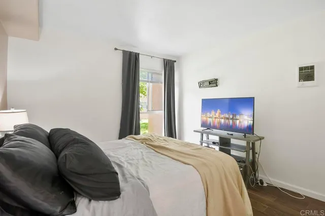 a bedroom with a bed and a closet