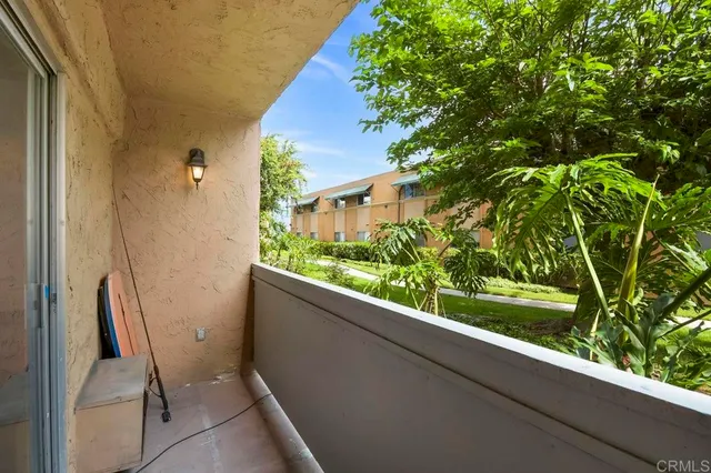 a view of a garden from a balcony