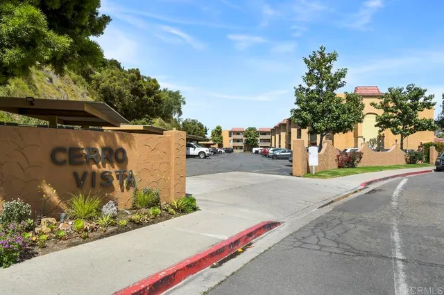 a view of a car parked in front of a house