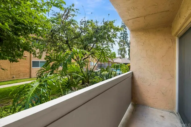 a view of a building with a yard