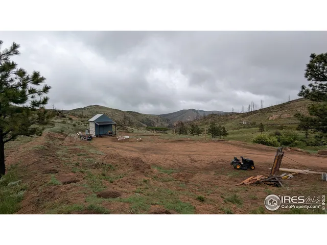 a open area with lake view and mountain view