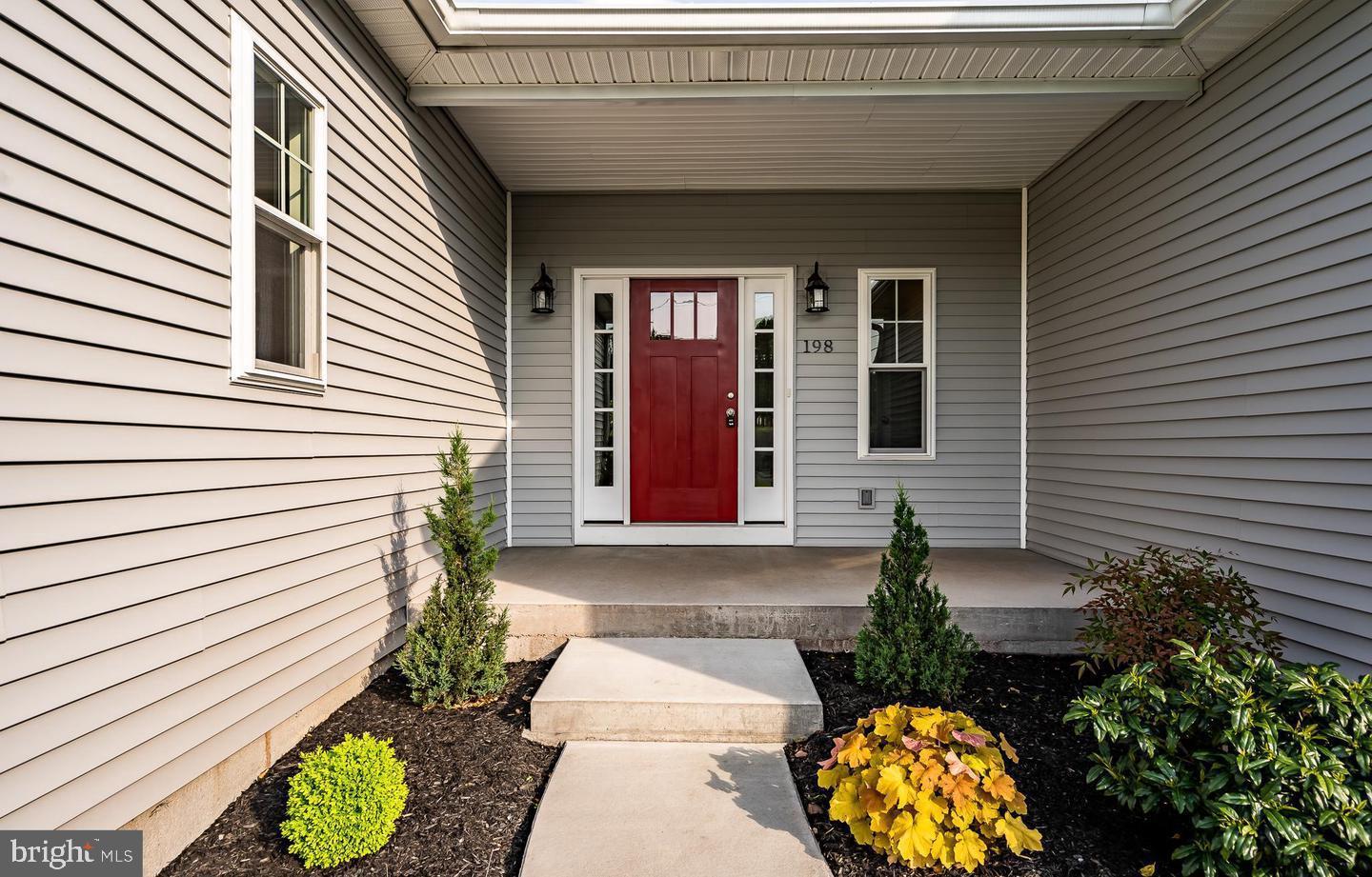 198 Cross Road Gilbertsville, PA 19525 - Photo 3 of 29 Charming entryway with vibrant red door.