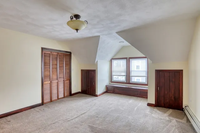 a view of empty room with front door