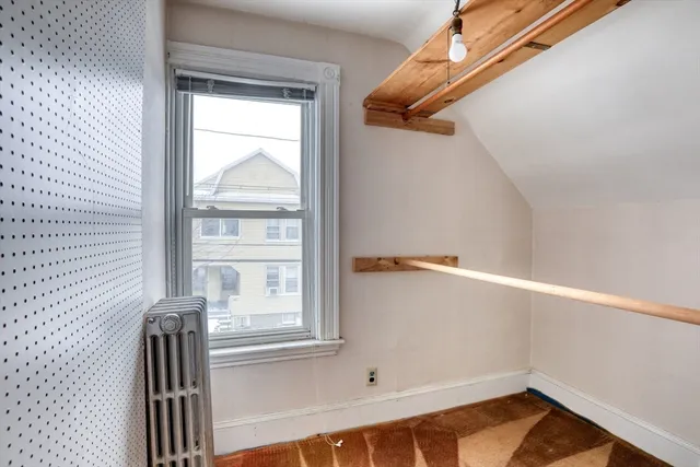 a view of a door and a window