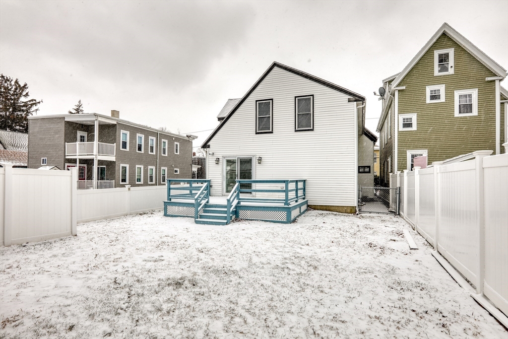 45 Read Street Winthrop, MA 02152 - Photo 29 of 30 a view of a house with a yard and wooden fence