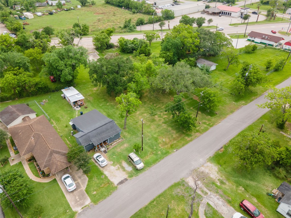 507 Cemetery Road Clute, TX 77531 - Photo 2 of 11 an aerial view of a house with a yard
