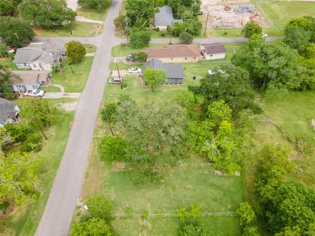 507 Cemetery Road Clute, TX 77531 - Photo 5 of 11 an aerial view of residential houses with outdoor space and trees all around