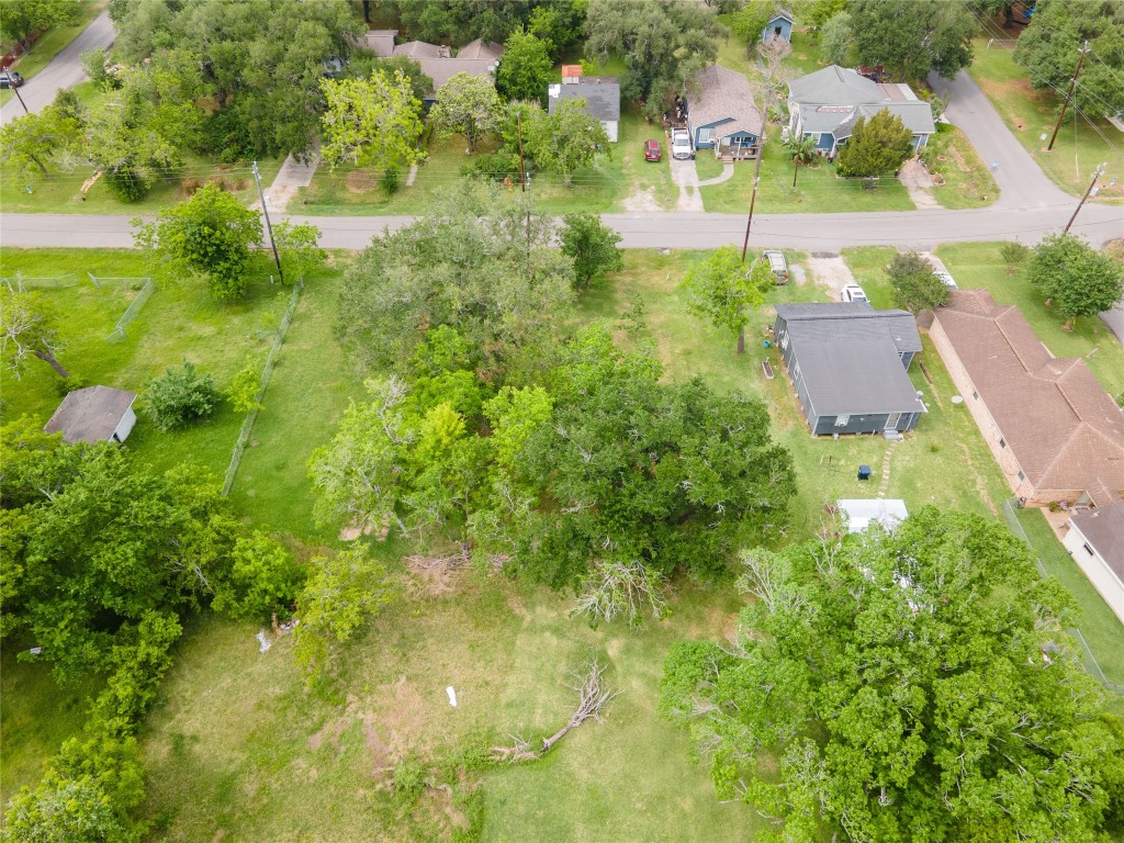 507 Cemetery Road Clute, TX 77531 - Photo 7 of 11 an aerial view of residential houses with outdoor space and trees all around