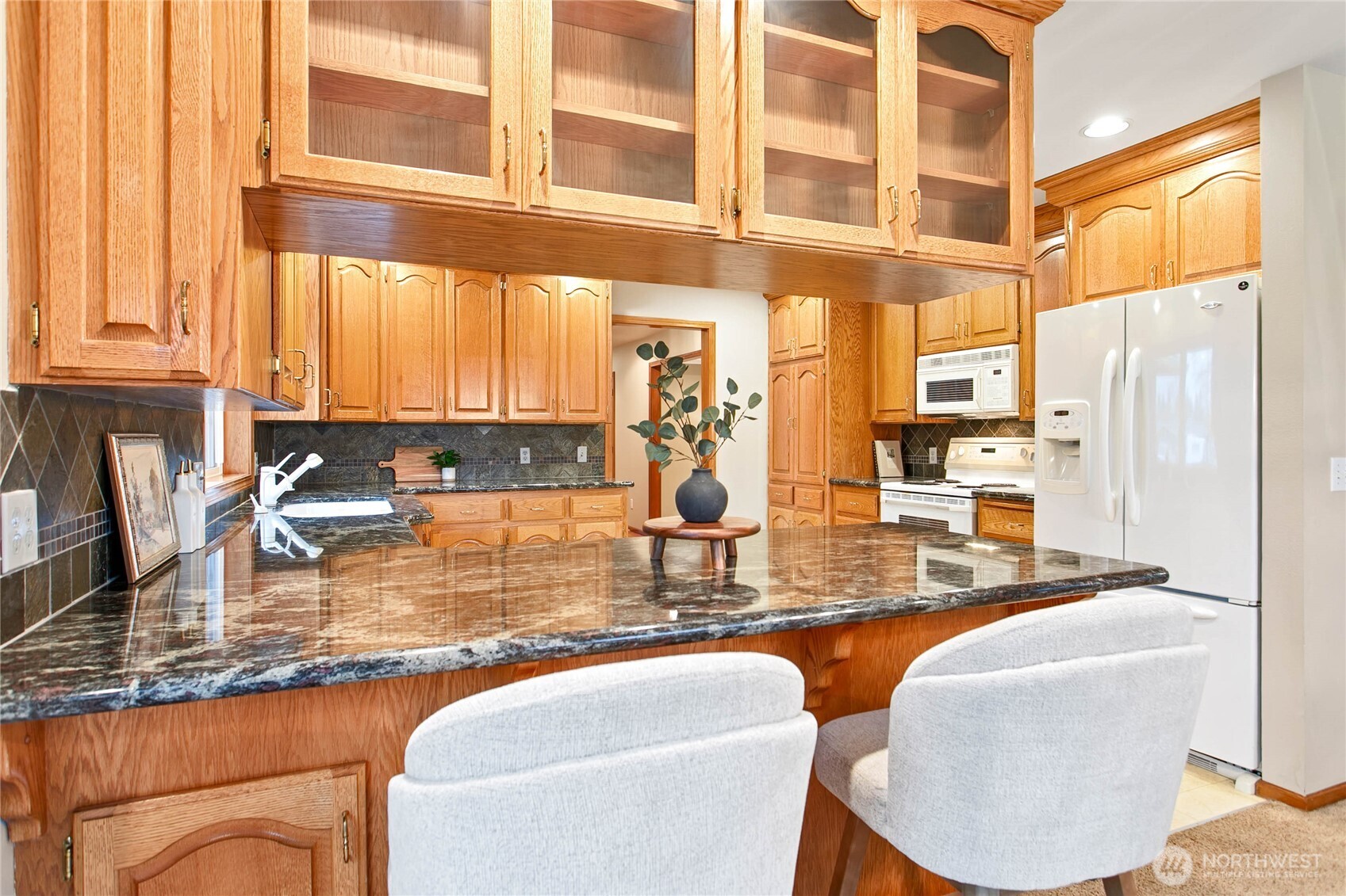 8639 Bender Road Lynden, WA 98264 - Photo 14 of 40 a dining table with chairs and window