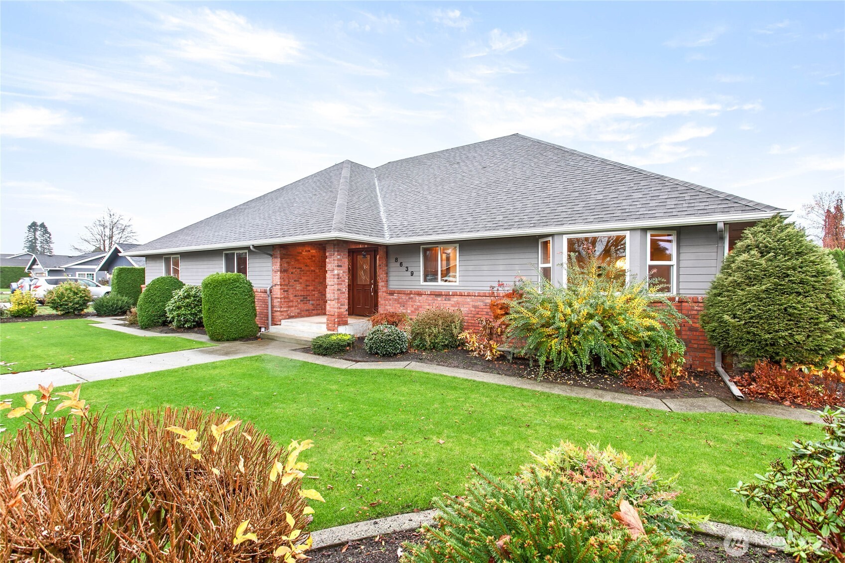 8639 Bender Road Lynden, WA 98264 - Photo 2 of 40 a front view of a house with garden