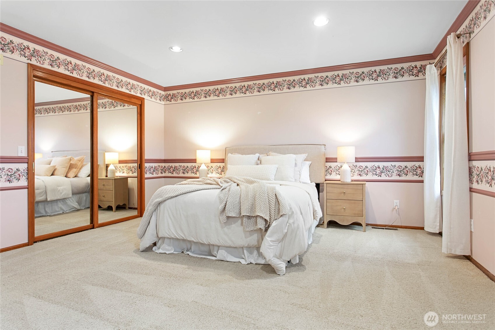 8639 Bender Road Lynden, WA 98264 - Photo 30 of 40 a bedroom with a bed and large window