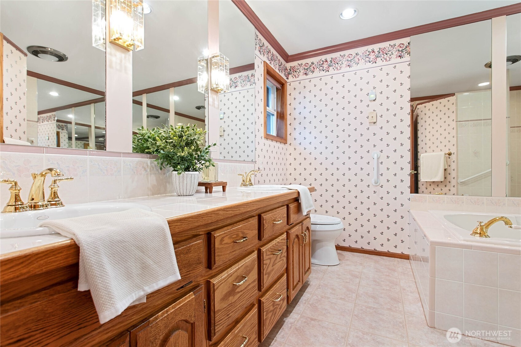 8639 Bender Road Lynden, WA 98264 - Photo 31 of 40 a bathroom with a double vanity sink mirror and toilet