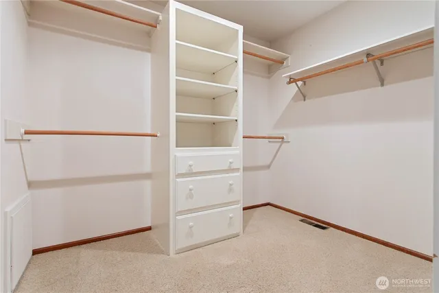 a view of an empty walk in closet
