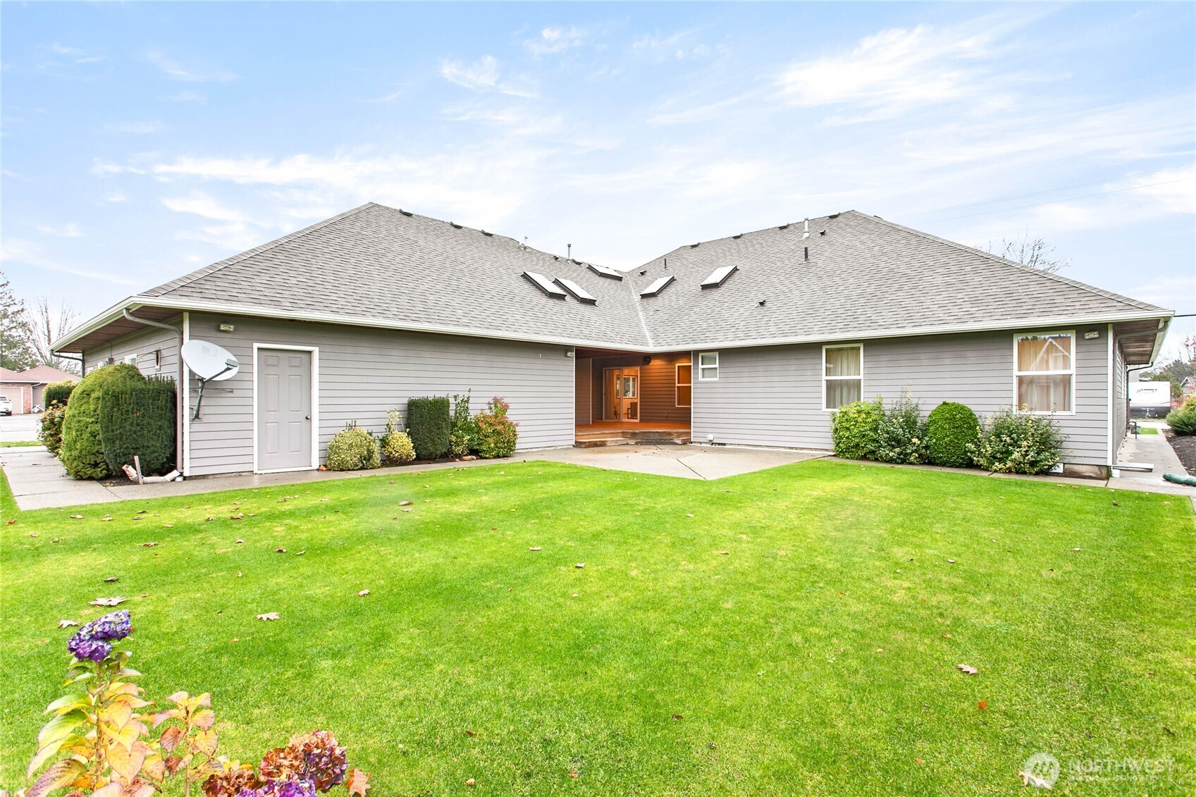 8639 Bender Road Lynden, WA 98264 - Photo 35 of 40 a view of a house with a backyard