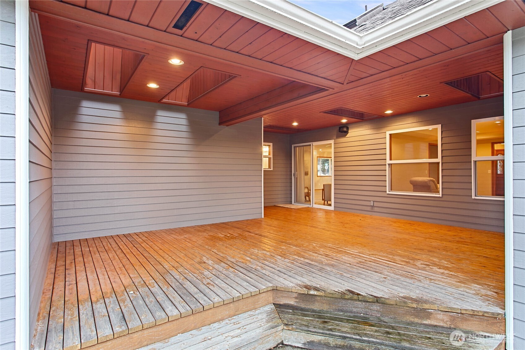 8639 Bender Road Lynden, WA 98264 - Photo 36 of 40 a view of an empty room with wooden floor and a window