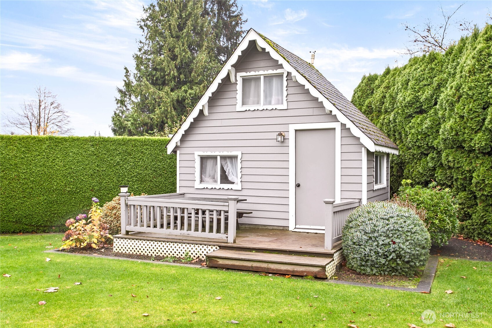 8639 Bender Road Lynden, WA 98264 - Photo 38 of 40 a view of a house with a yard and a garden