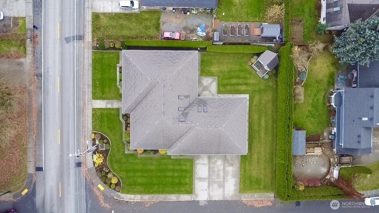 8639 Bender Road Lynden, WA 98264 - Photo 39 of 40 an aerial view of a house with outdoor space swimming pool