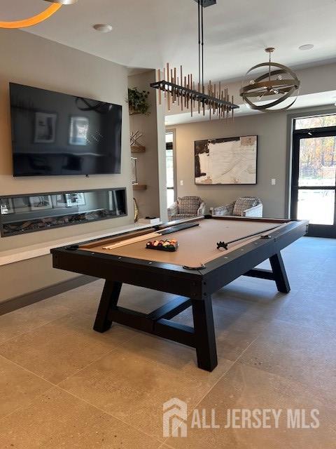6202 Domzal Road, Unit 6202 Sayreville, NJ 08872 - Photo 11 of 12 a room with pool table flat screen tv and windows