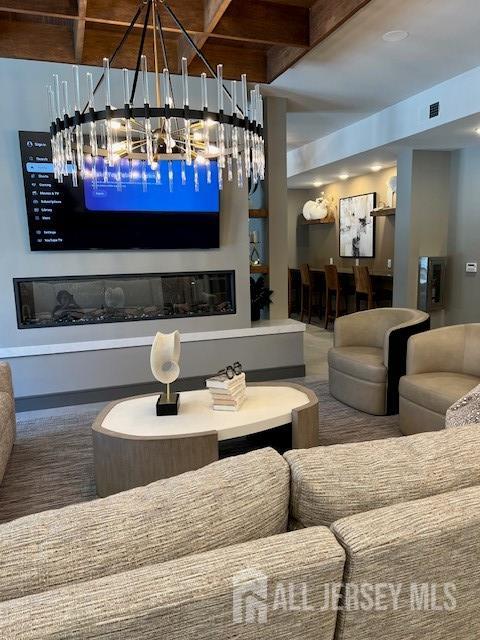 6202 Domzal Road, Unit 6202 Sayreville, NJ 08872 - Photo 10 of 12 a outdoor living space with patio furniture and a fireplace