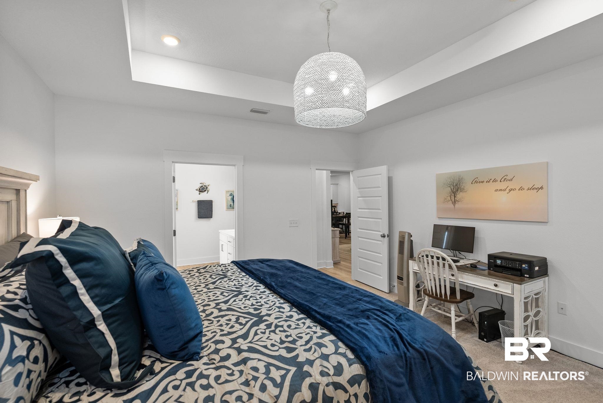 9899 Willet Way Foley, AL 36535 - Photo 16 of 37 White-painted walls and a tray ceiling with recessed lighting
