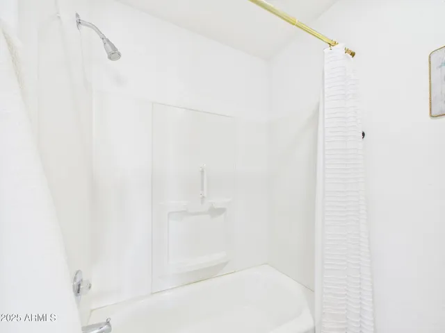 an empty room with shelves