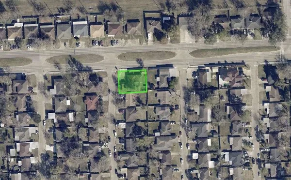 a black white and white photo of a bathroom