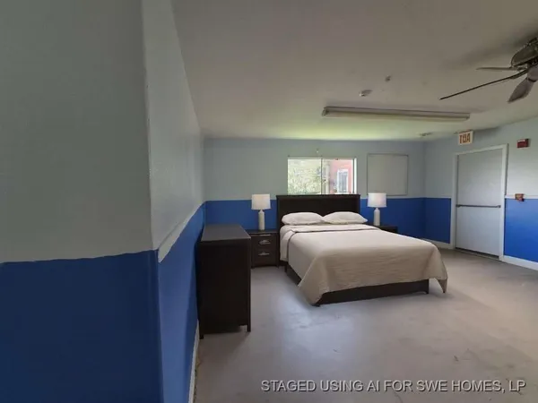 a spacious bedroom with a bed and a closet