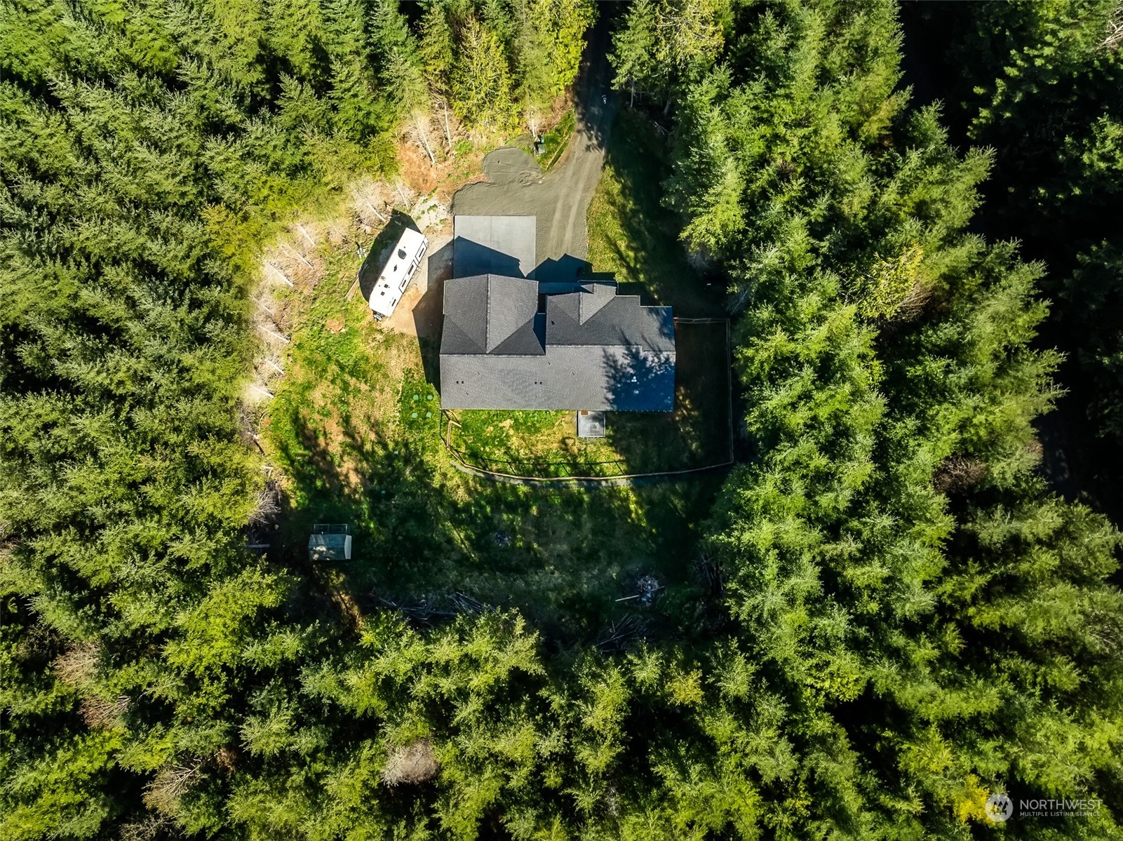 471 Southeast Ellis Road Shelton, WA 98584 - Photo 2 of 38 a view of a house with a tree