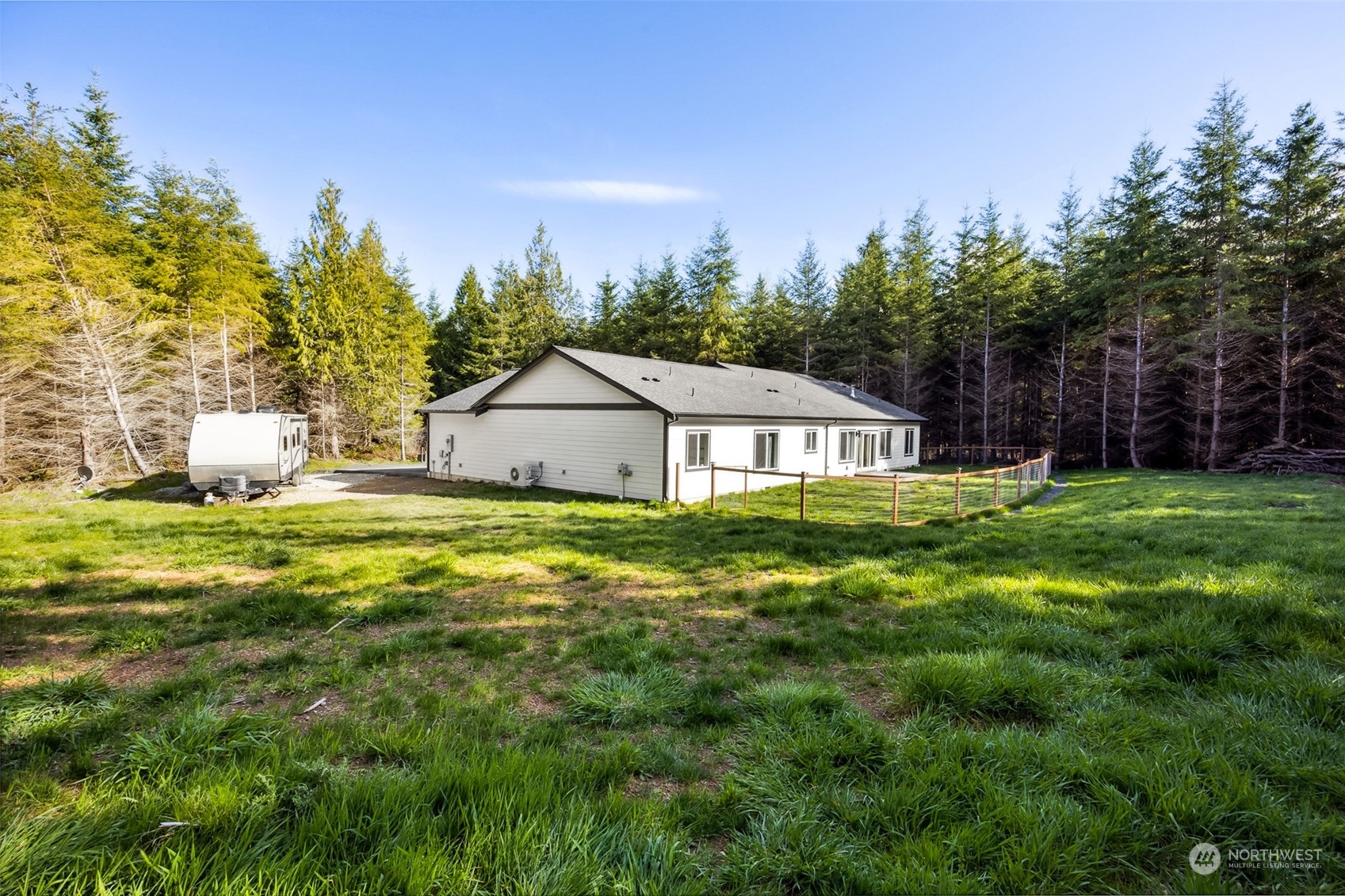 471 Southeast Ellis Road Shelton, WA 98584 - Photo 34 of 38 a front view of house with yard and trees in the background