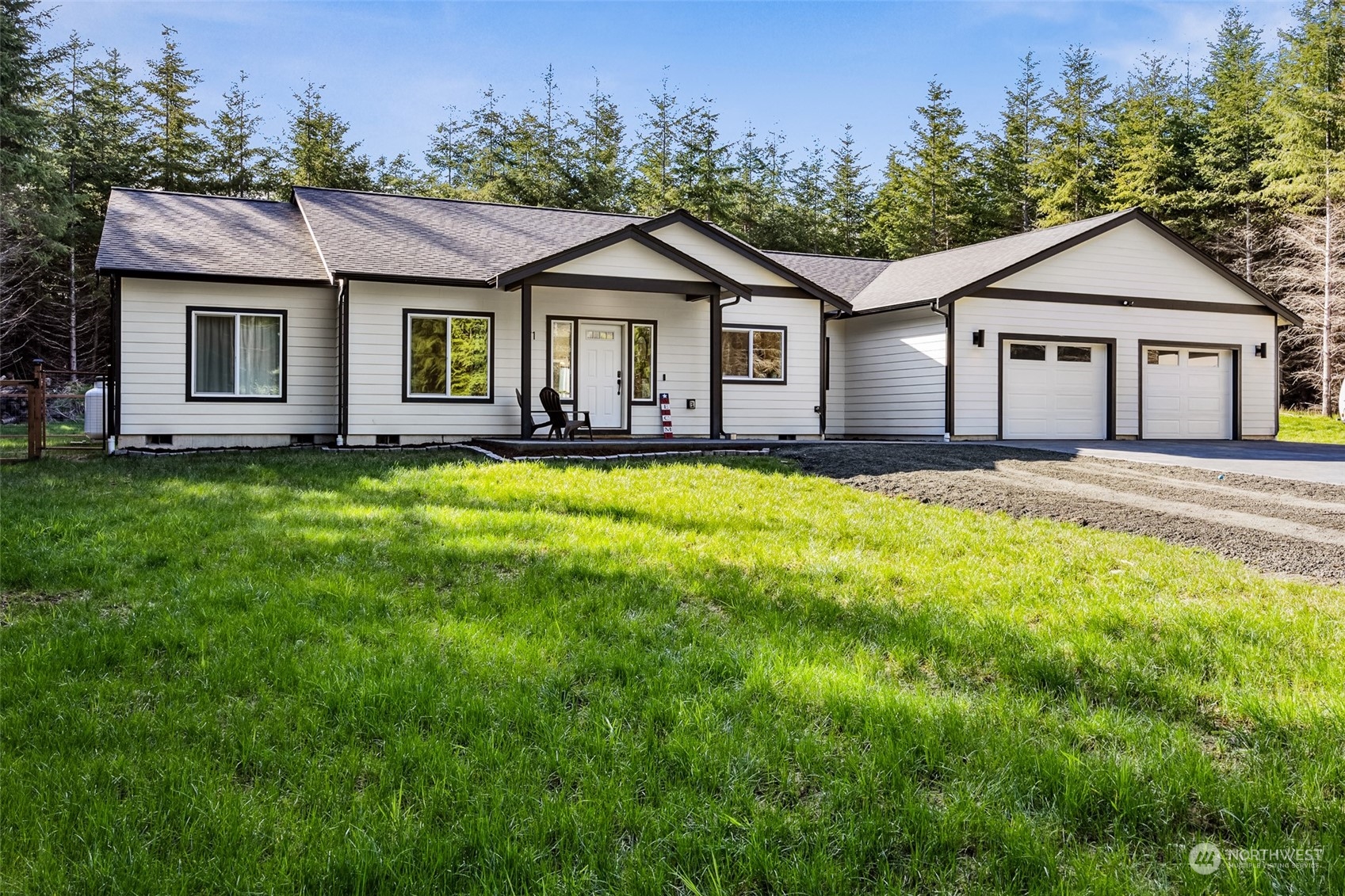 471 Southeast Ellis Road Shelton, WA 98584 - Photo 36 of 38 a front view of a house with a yard