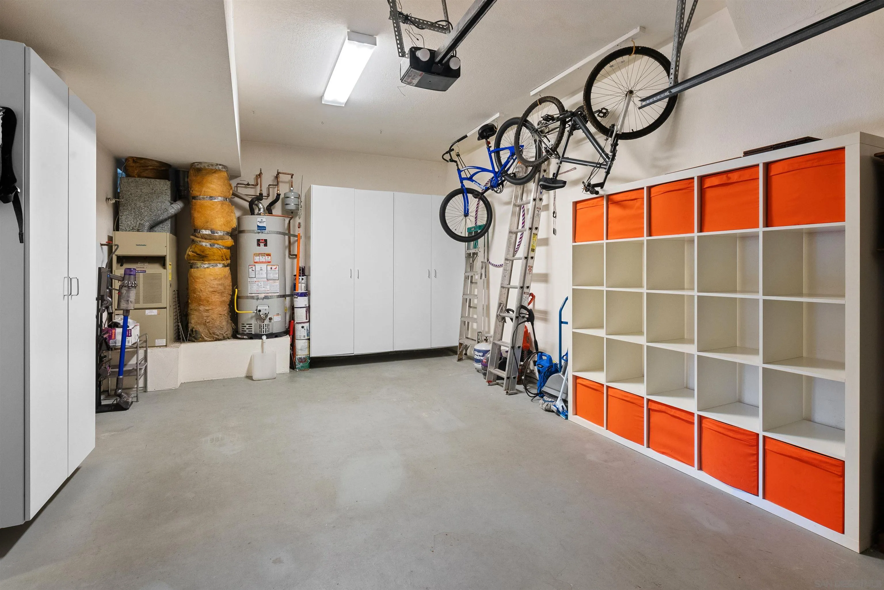 6755 Tyrian Street La Jolla, CA 92037 - Photo 16 of 60 a view of an empty room with gym equipment