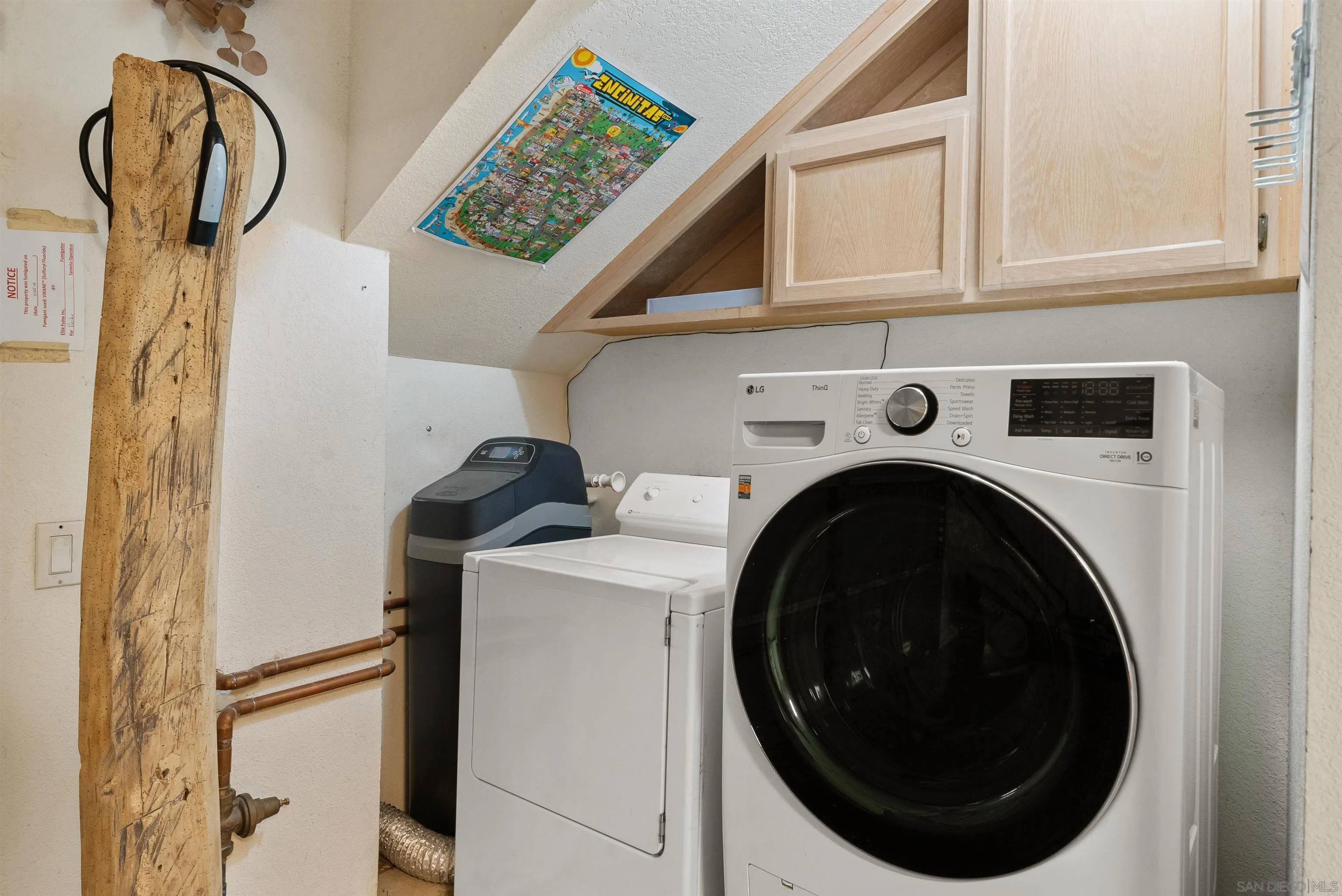 6755 Tyrian Street La Jolla, CA 92037 - Photo 17 of 60 a utility room with dryer and washer
