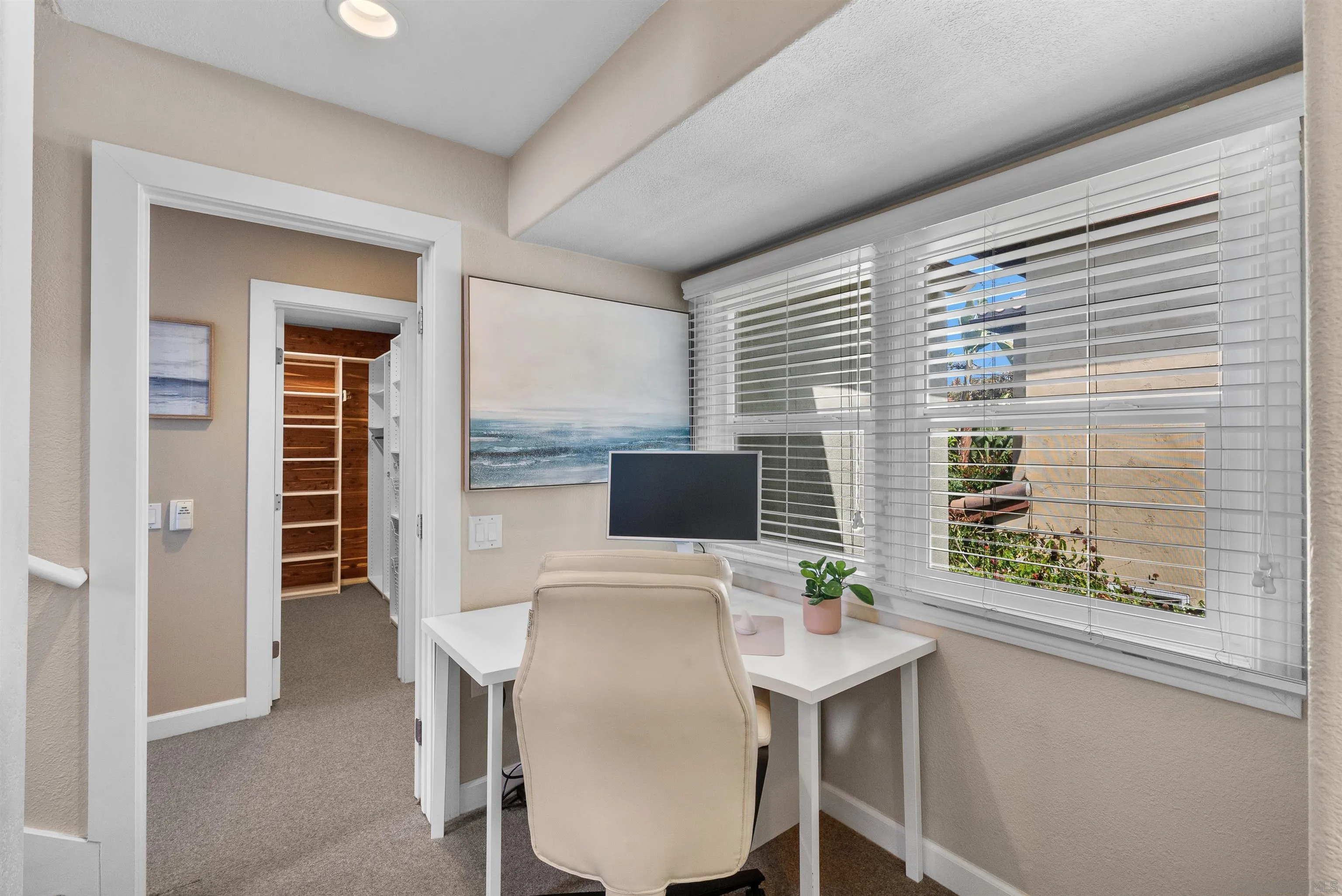 6755 Tyrian Street La Jolla, CA 92037 - Photo 19 of 60 a workspace with furniture and window